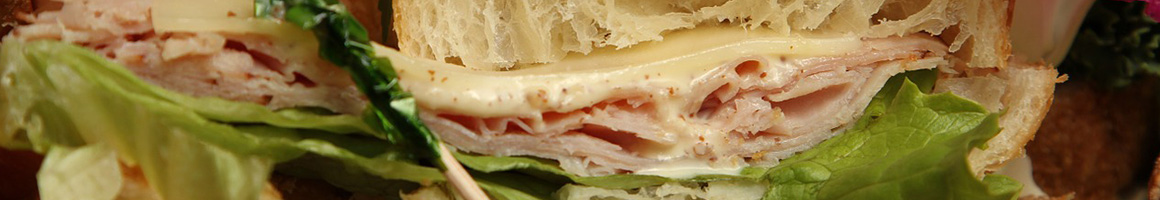 Eating Sandwich Cafe at Cafe Arpeggio NB restaurant in New Bedford, MA.